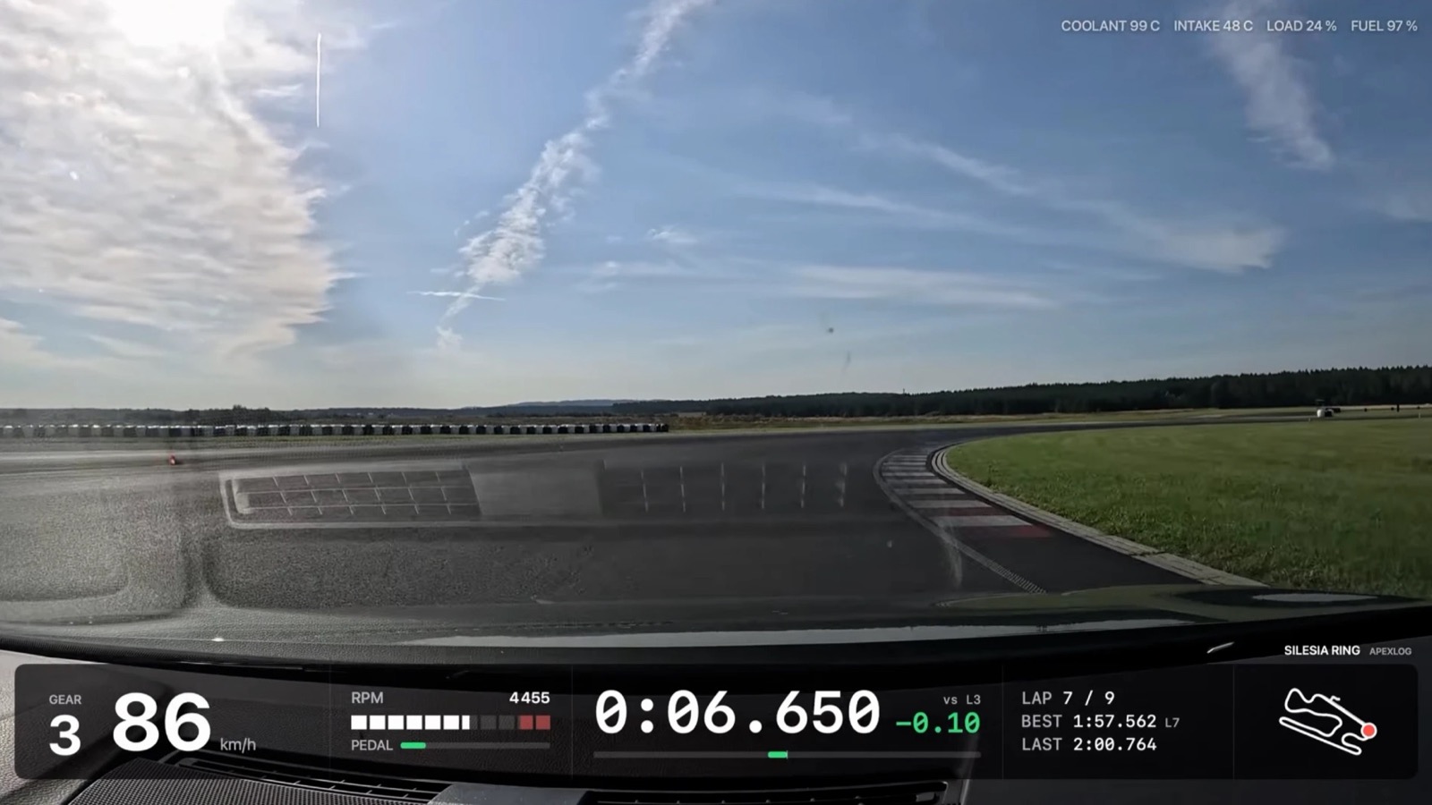 Frame from an ApexLog overlay render of a Golf GTI Edition 50 lap at Silesia Ring: gear and speed, an RPM bar with the pedal, the running lap time with the delta to lap 3, lap 7 of 9 with best and last lap times, a track mini-map, and coolant, intake, load and fuel readings along the top.